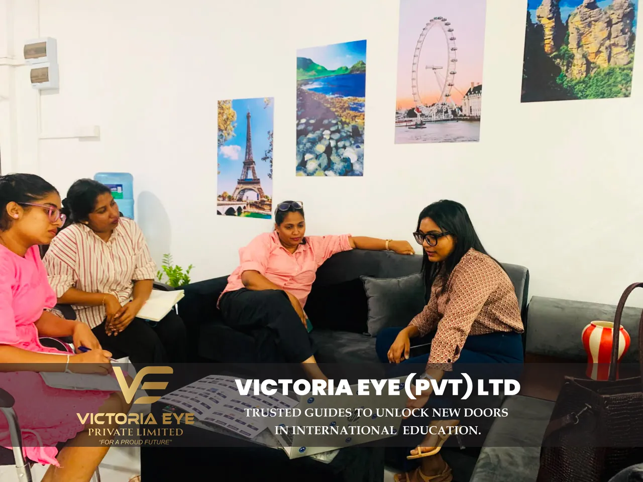 Clients and Victoria Eye staff chatting in the office