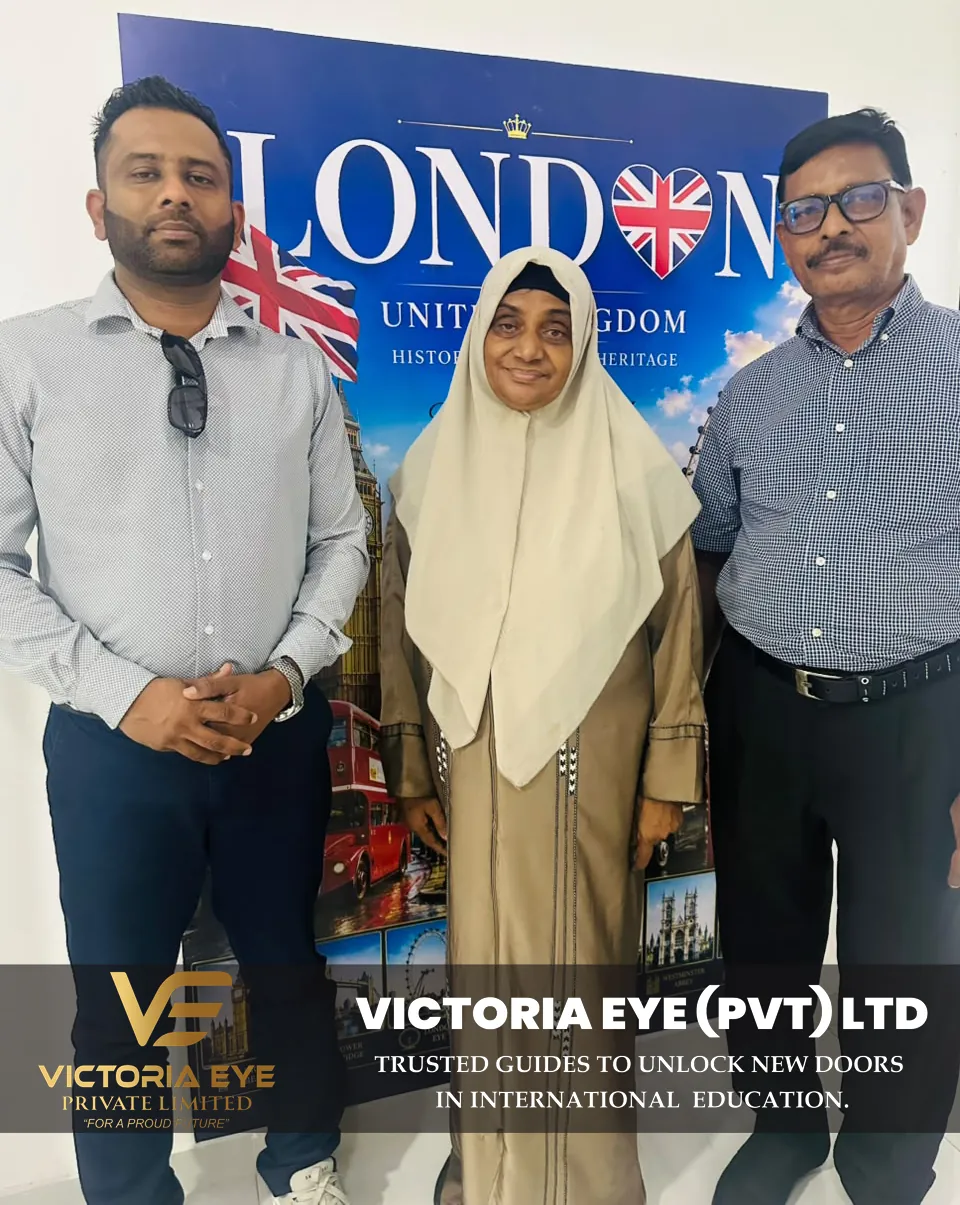 Clients and Victoria Eye staff in front of a London backdrop