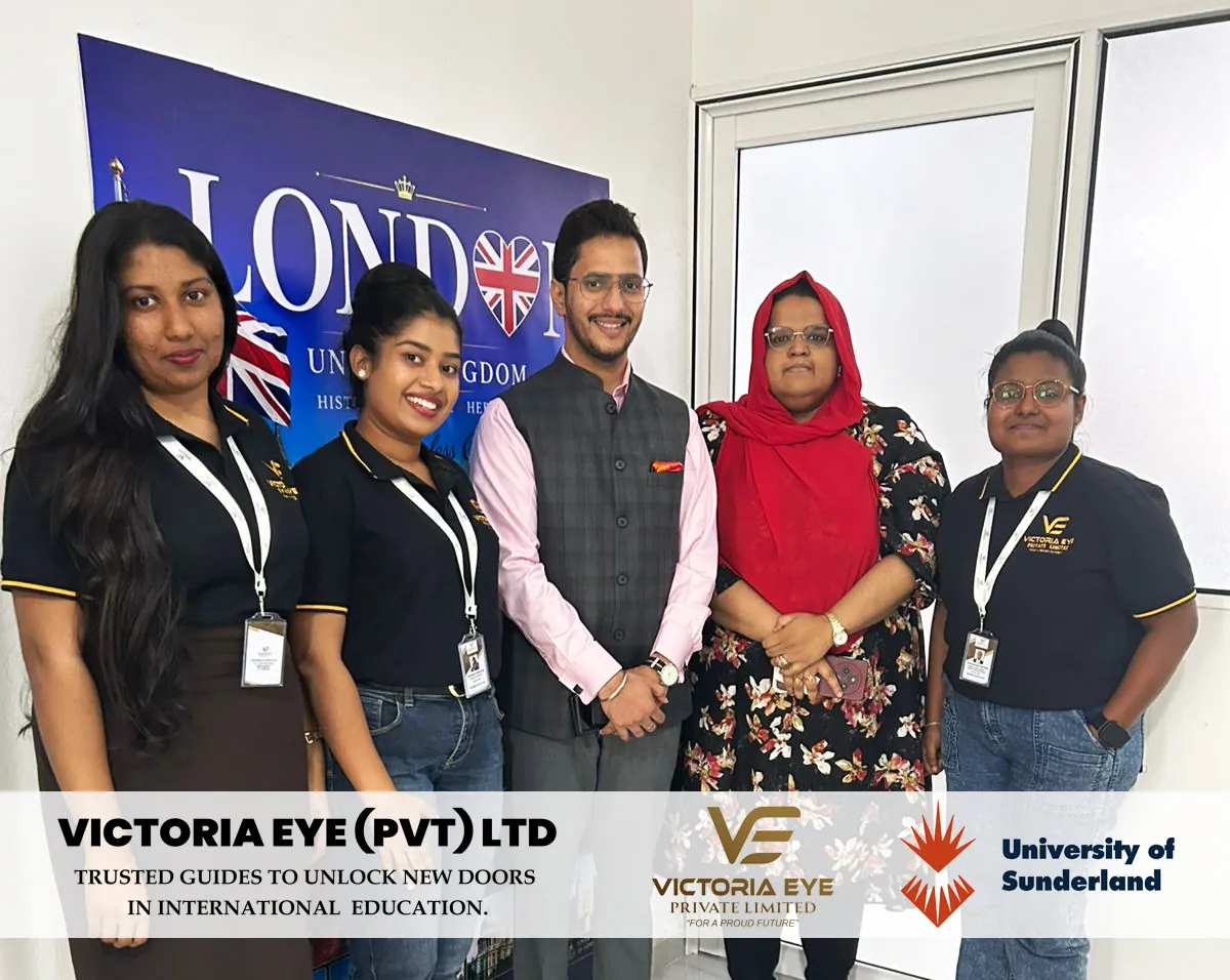 Victoria Eye staff with happy clients at the office